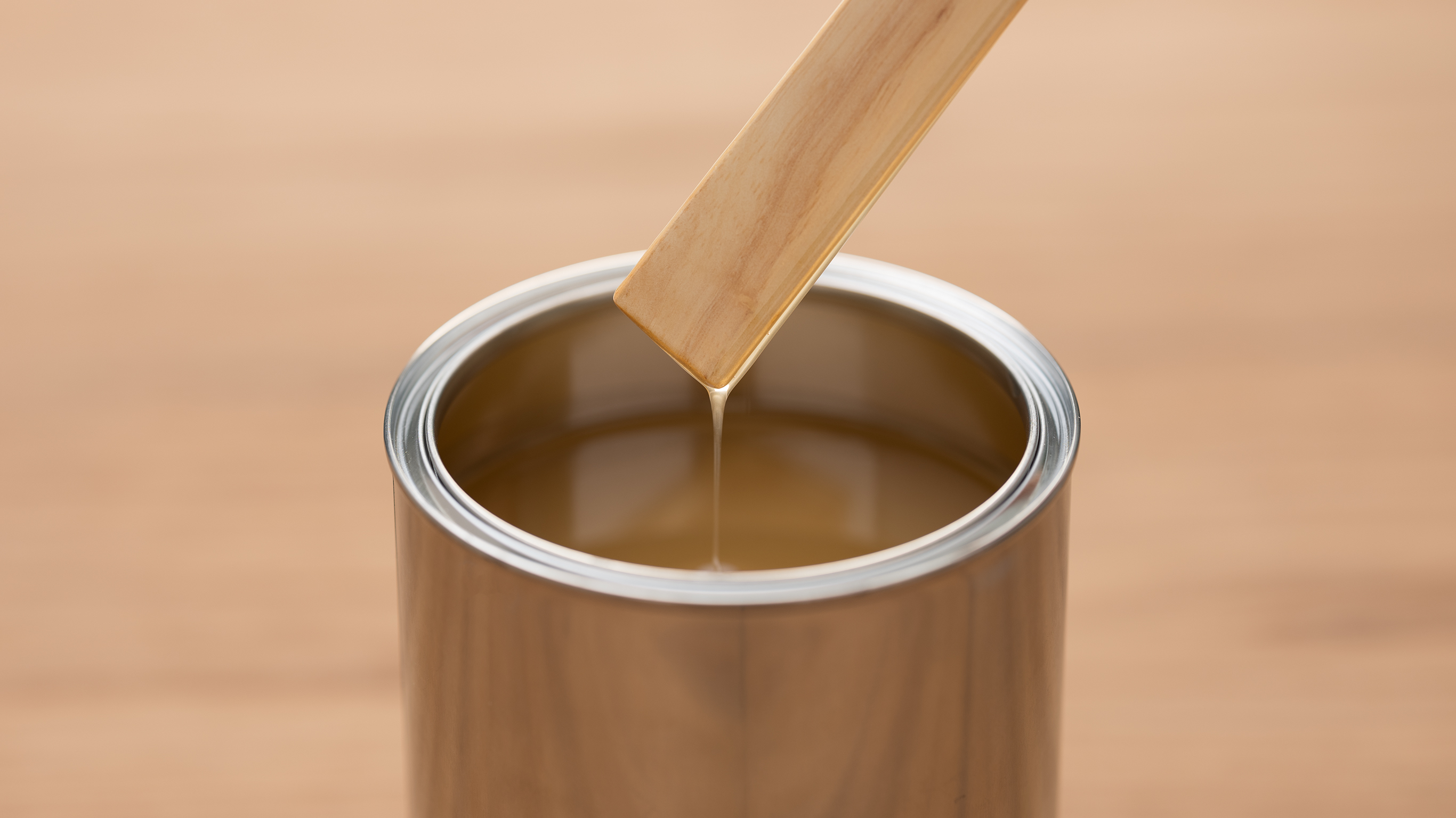 Tin of stain A tin of wood stain